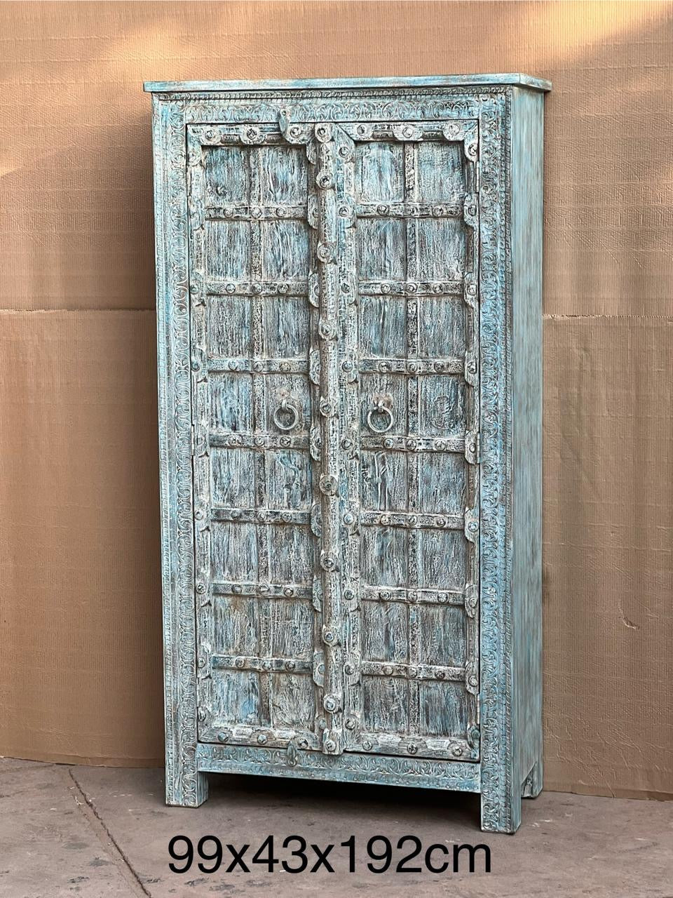 Carved blue cabinet