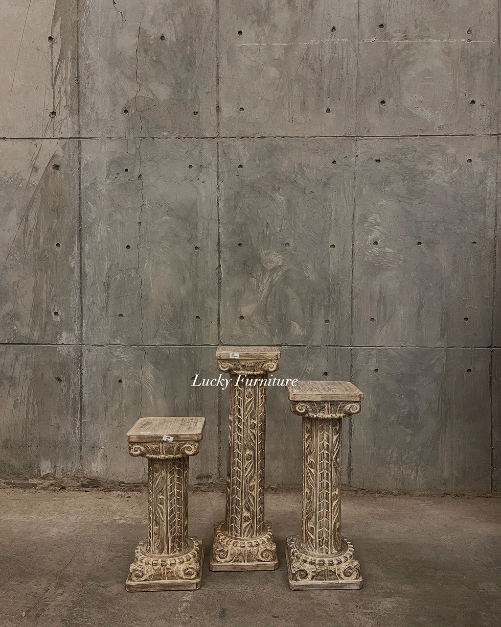 Carved pedestal