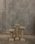 Carved pedestal