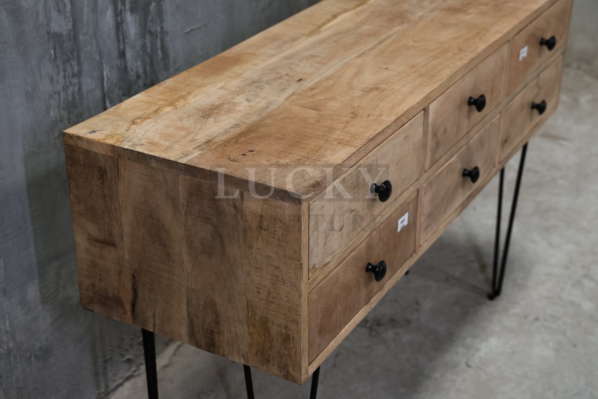 6 drawer hairpin console.