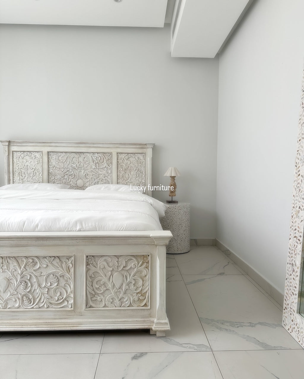 Carved bed white wash