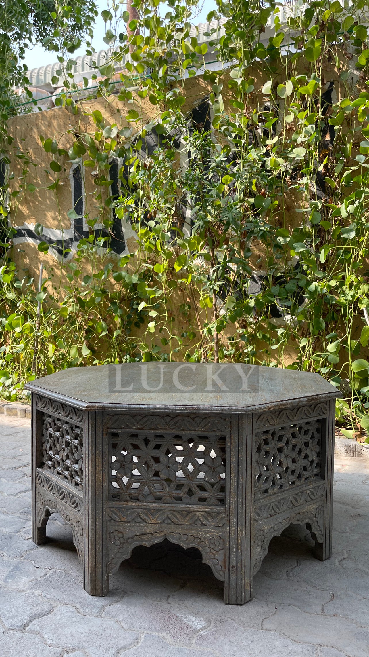 Octagonal carved coffee table