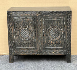 Tribal pattern carved sideboard