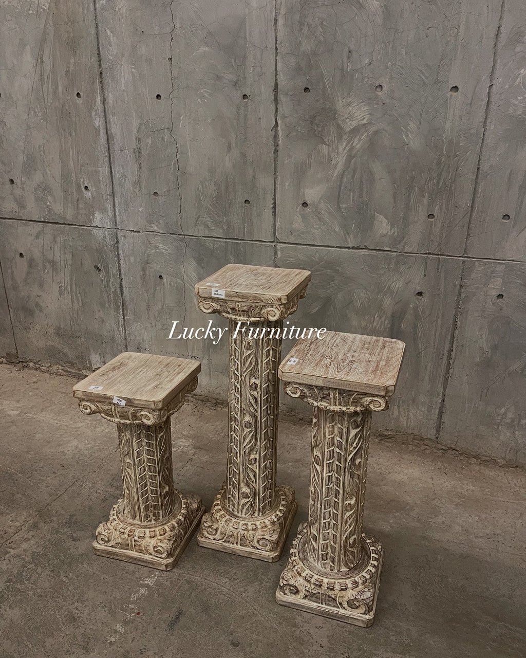 Carved pedestal