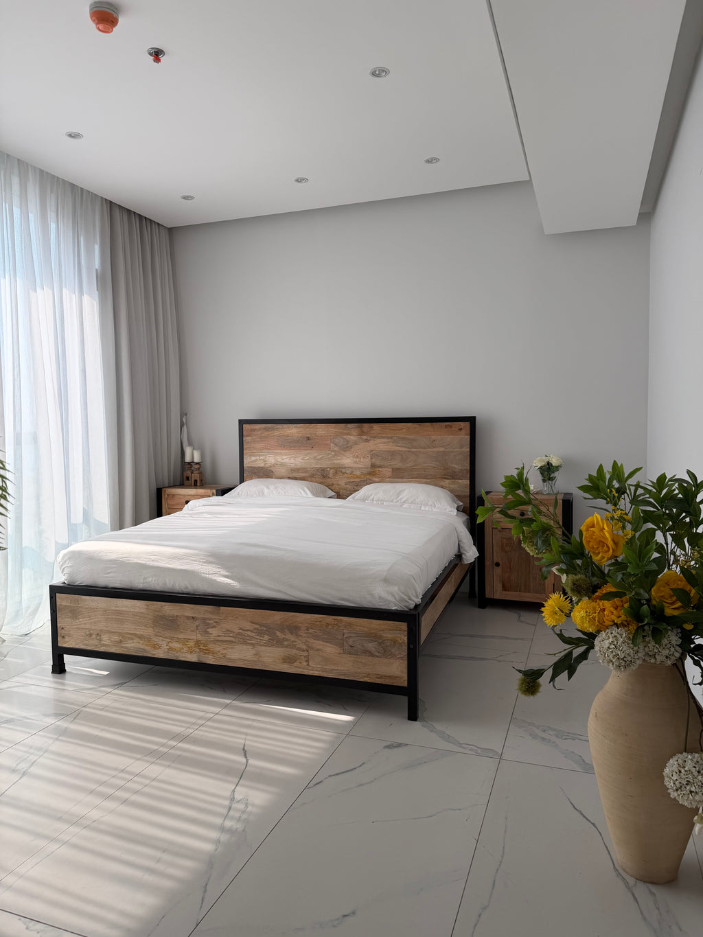 Minimalist metal and wood bed