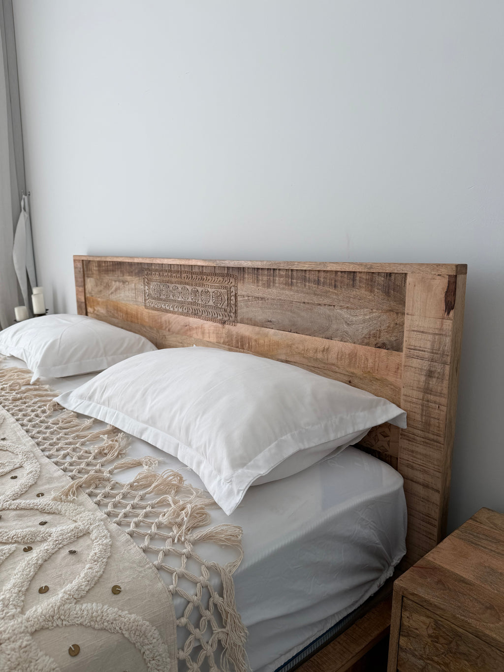 Low headboard carved bed