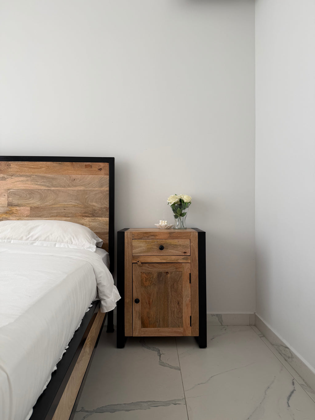 Minimalist metal and wood bed