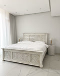 Carved bed white wash