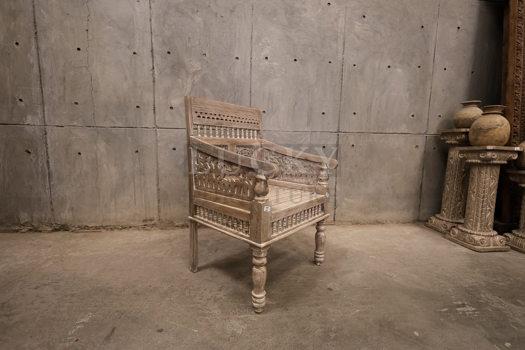 Carved Dewan single seater lime wash