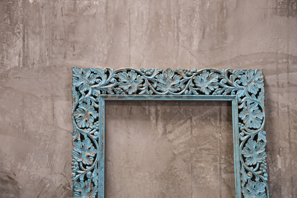 Vibrant blue Carved mirror frame