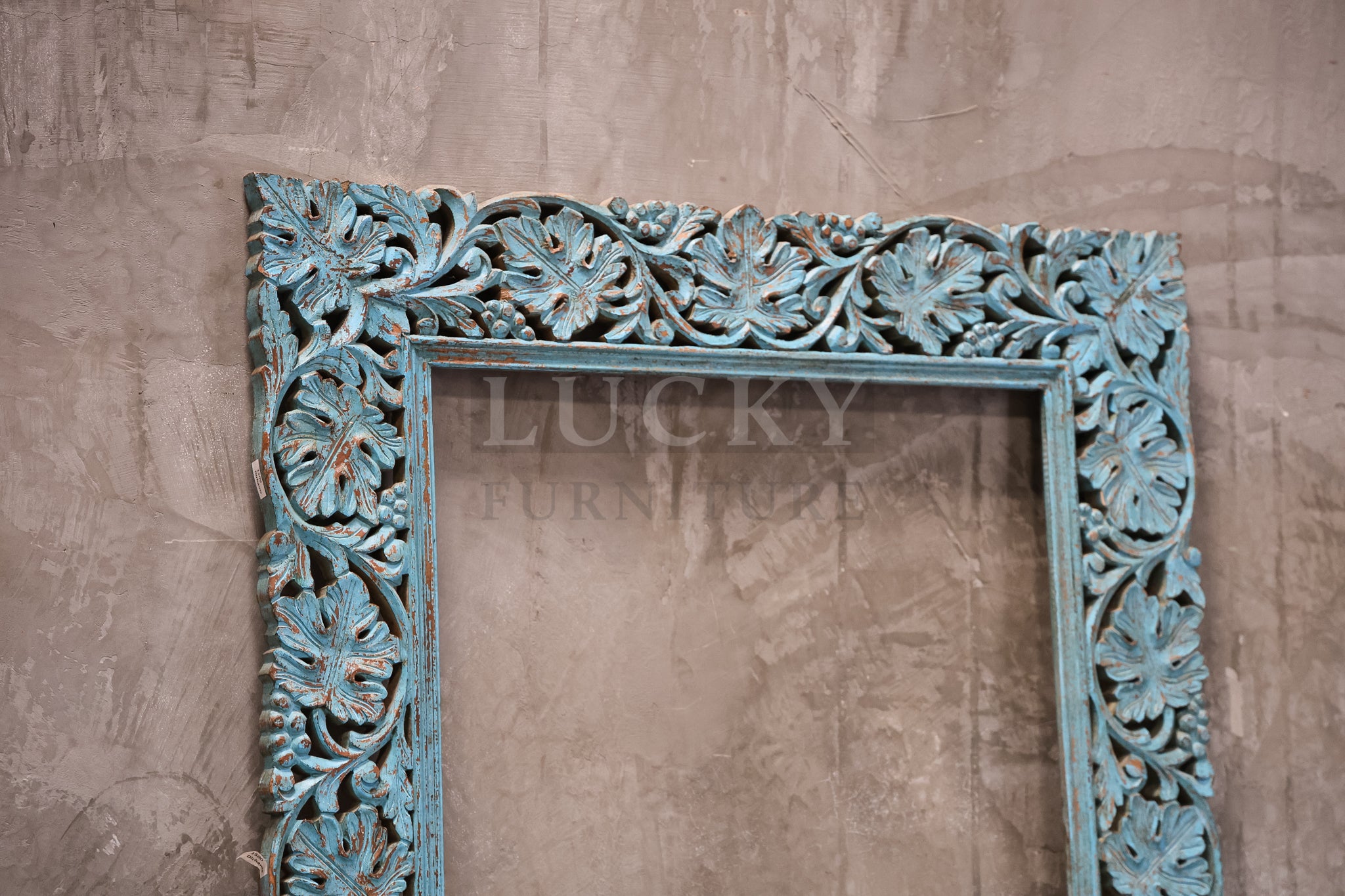 Vibrant blue Carved mirror frame