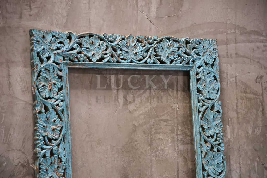 Vibrant blue Carved mirror frame