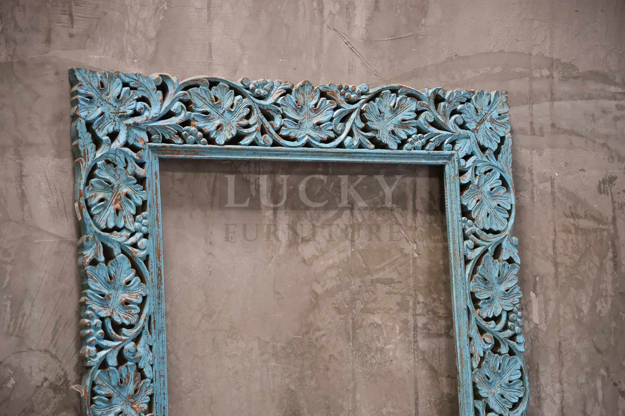 Vibrant blue Carved mirror frame