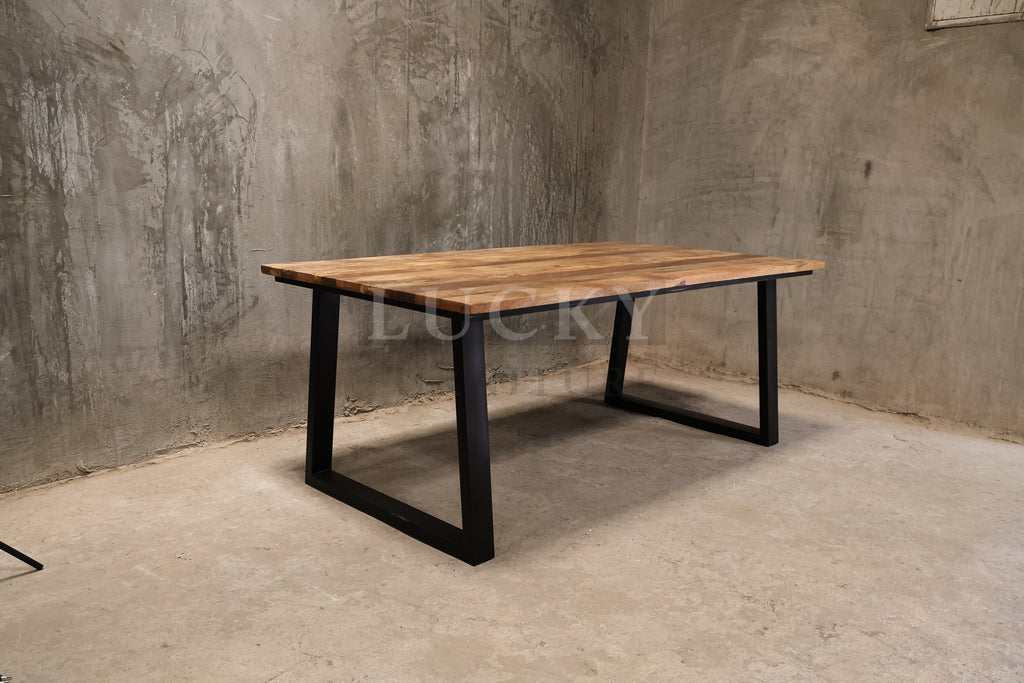 Mango wood metal slant legs table.
