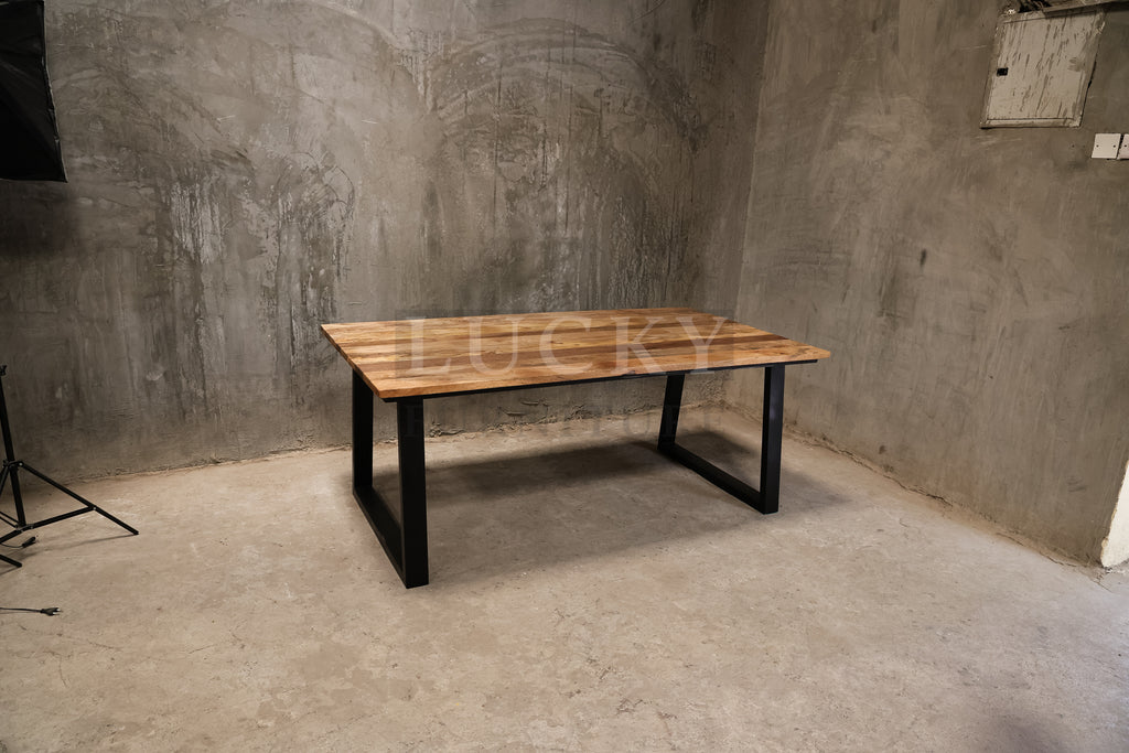 Mango wood metal slant legs table.