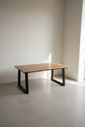 Mango wood metal slant legs table.