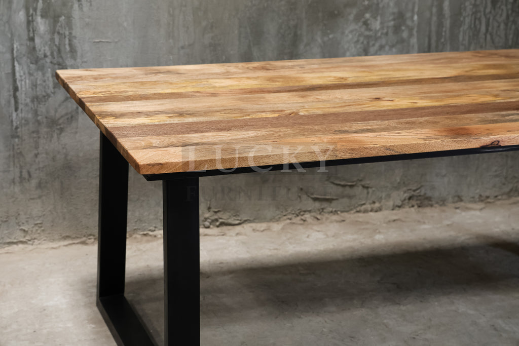 Mango wood metal slant legs table.