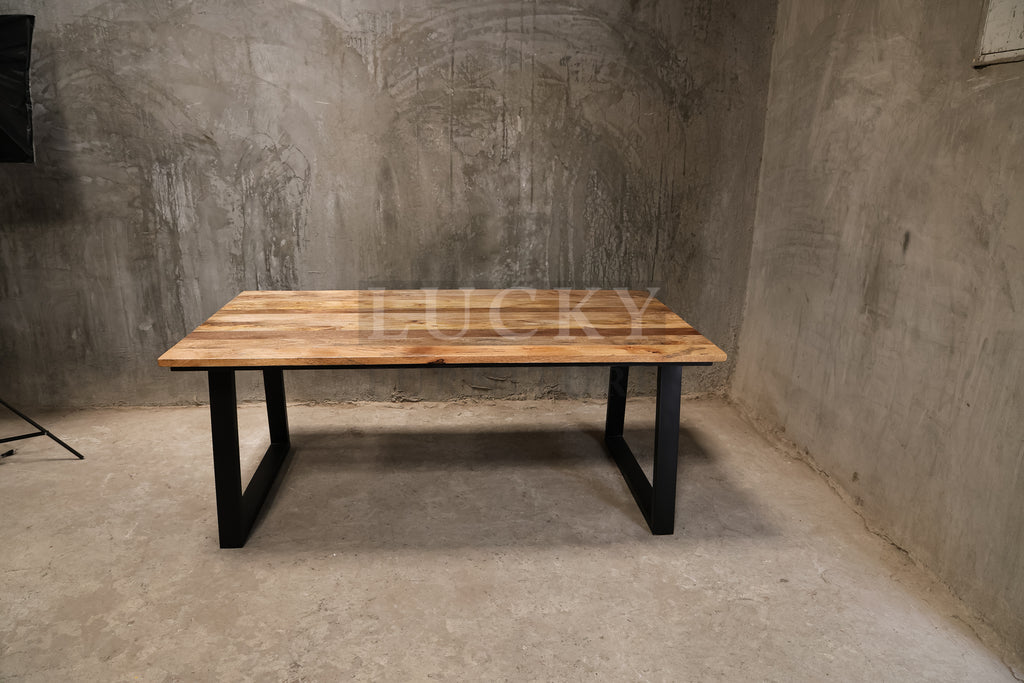 Mango wood metal slant legs table.