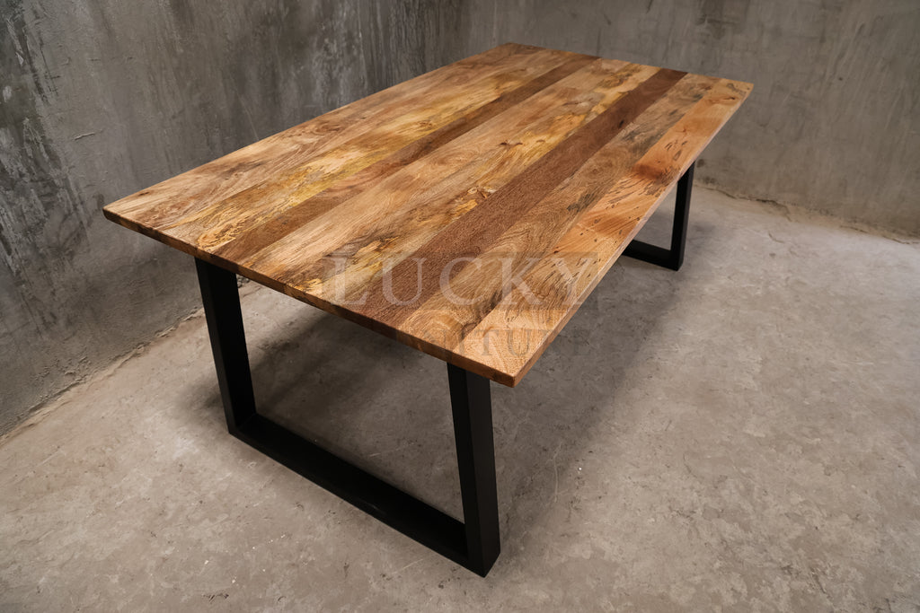 Mango wood metal slant legs table.