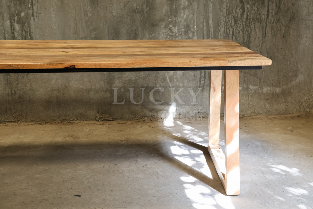 Mango wood slant wooden legs table.