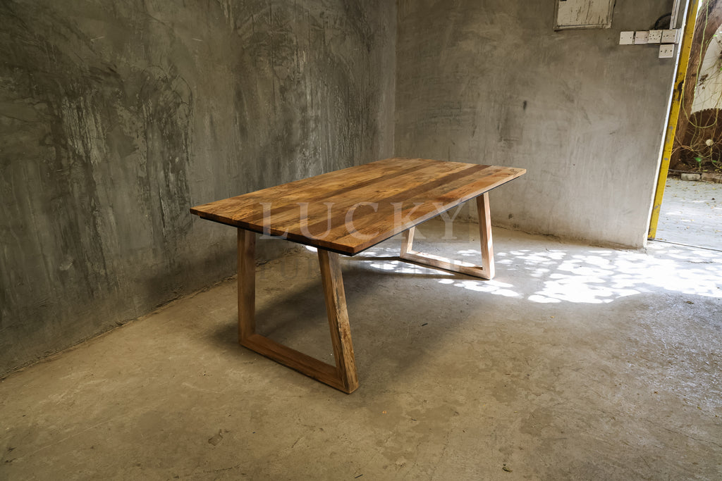 Mango wood slant wooden legs table.