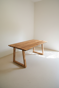 Mango wood slant wooden legs table.