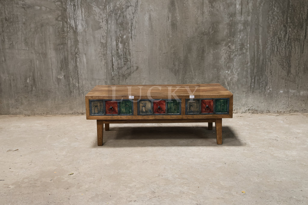 Multi color carved coffee table.