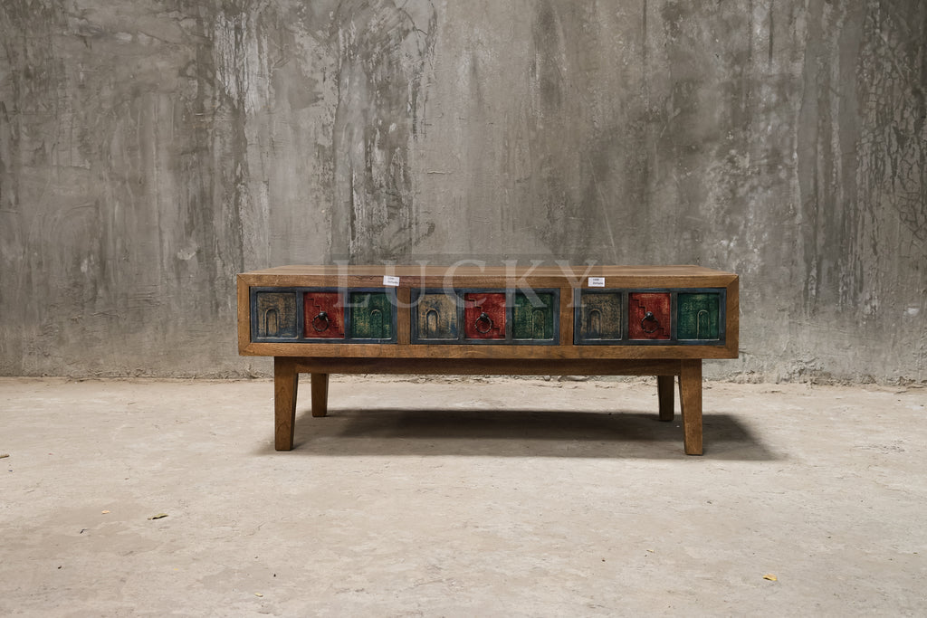 Multi color carved coffee table.