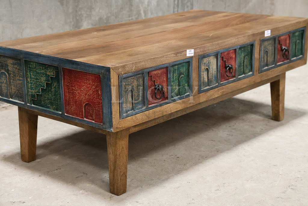 Multi color carved coffee table.