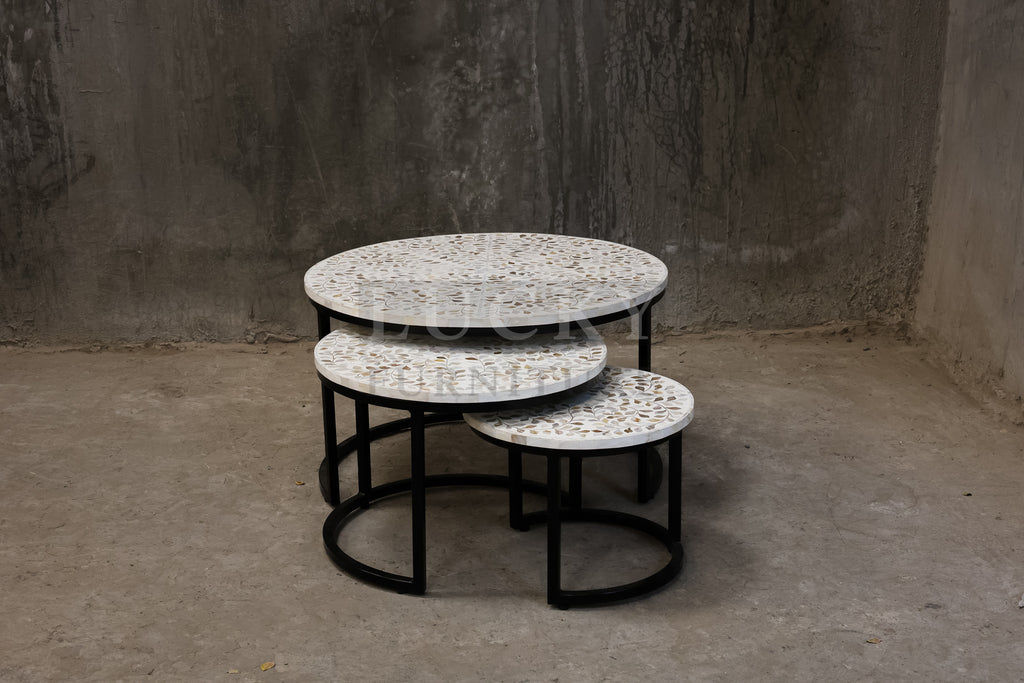 Mother of pearl inlay nesting table.