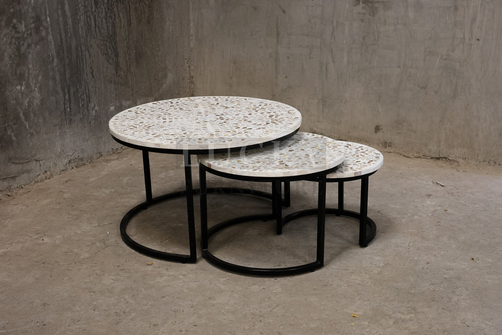 Mother of pearl inlay nesting table.