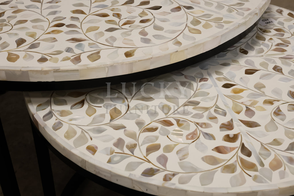 Mother of pearl inlay nesting table.
