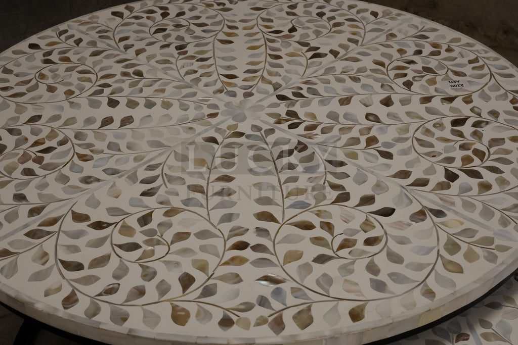 Mother of pearl inlay nesting table.
