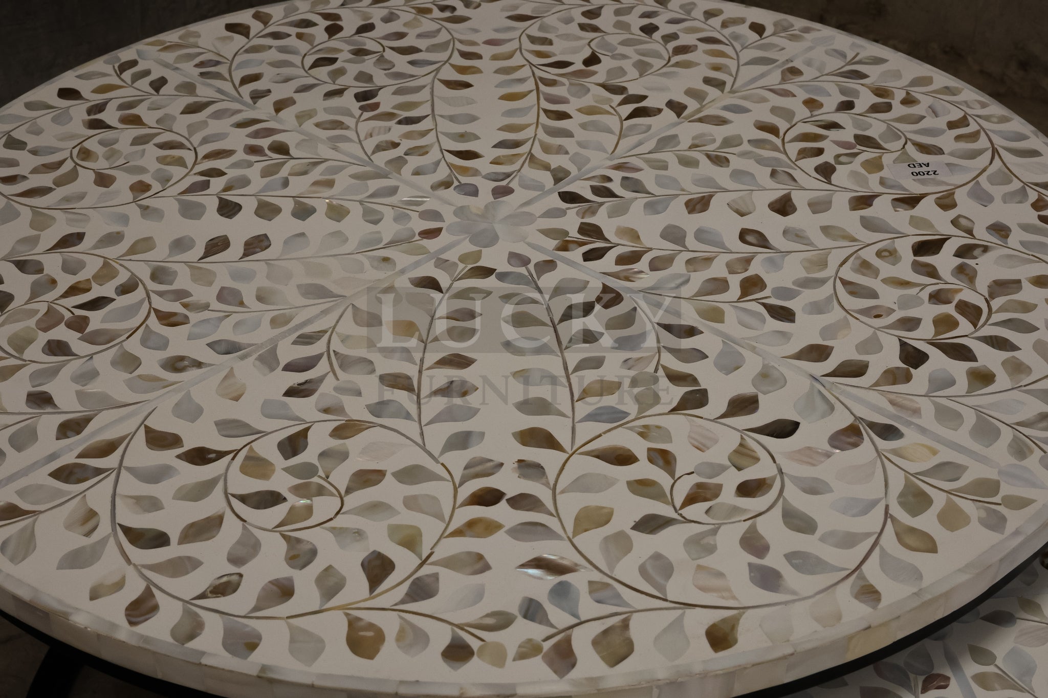 Mother of pearl inlay nesting table.