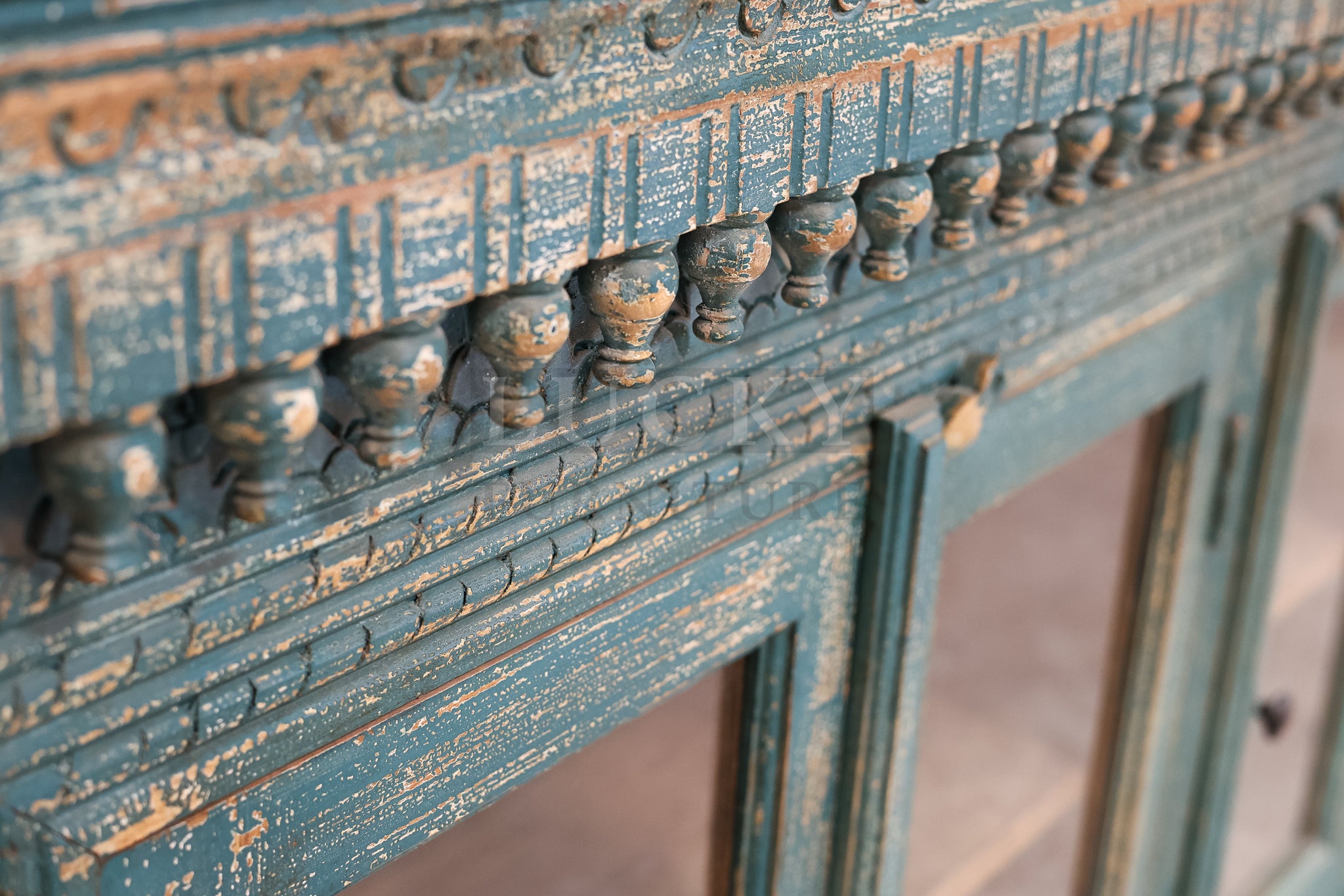 Carved glass door vibrant sideboard.