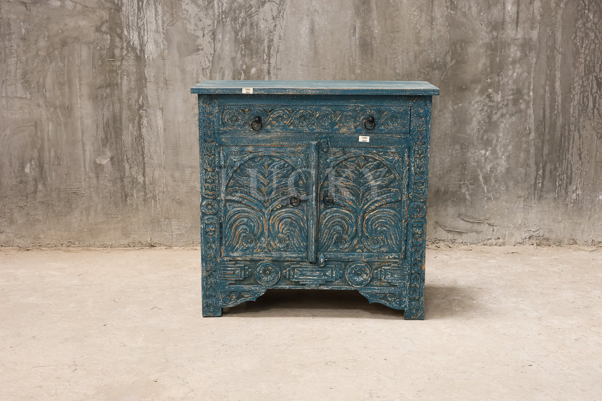 Carved vibrant sideboard.