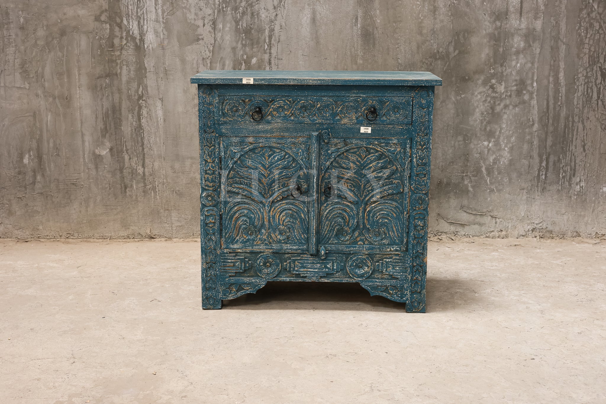 Carved vibrant sideboard.