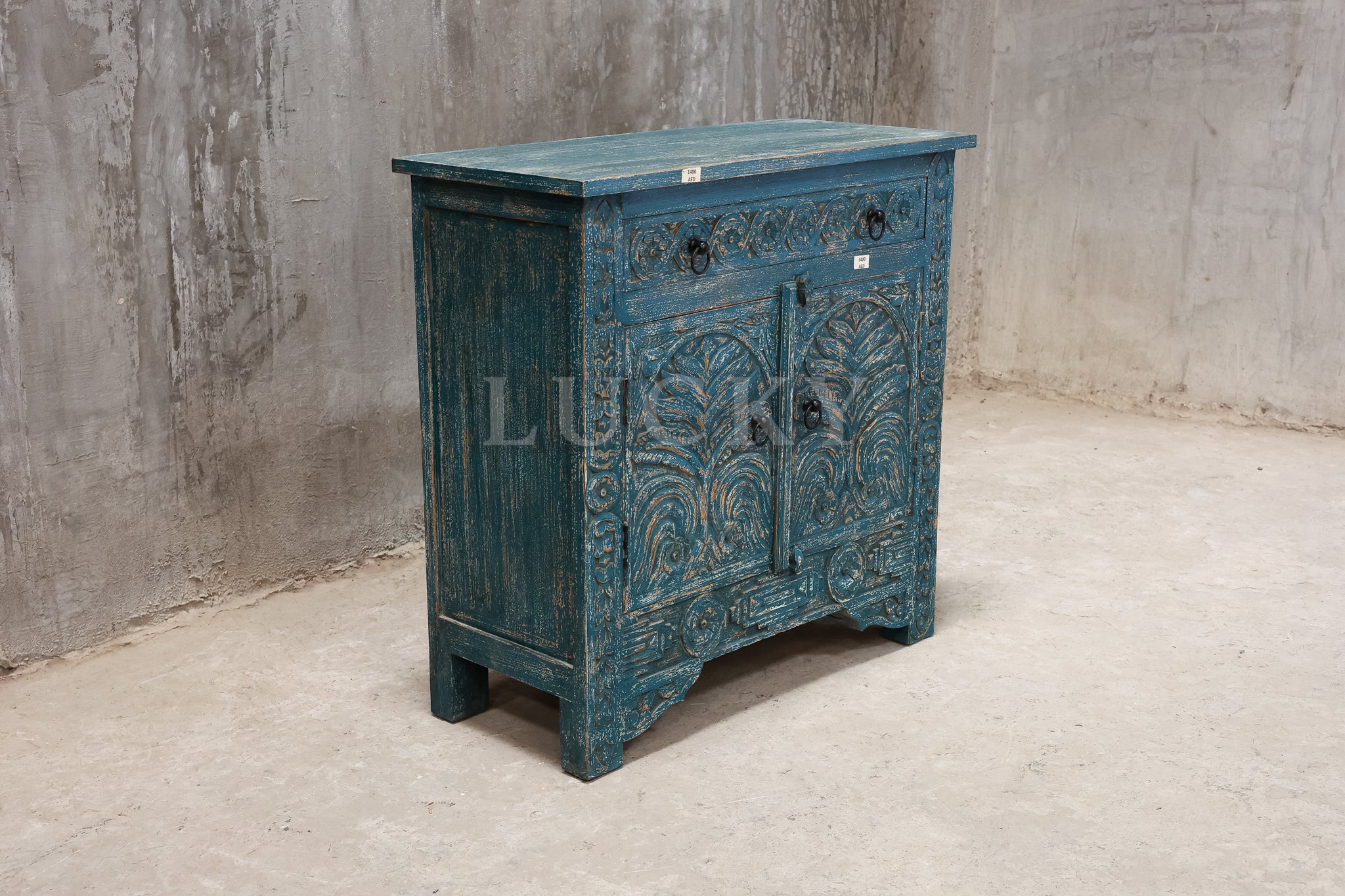 Carved vibrant sideboard.
