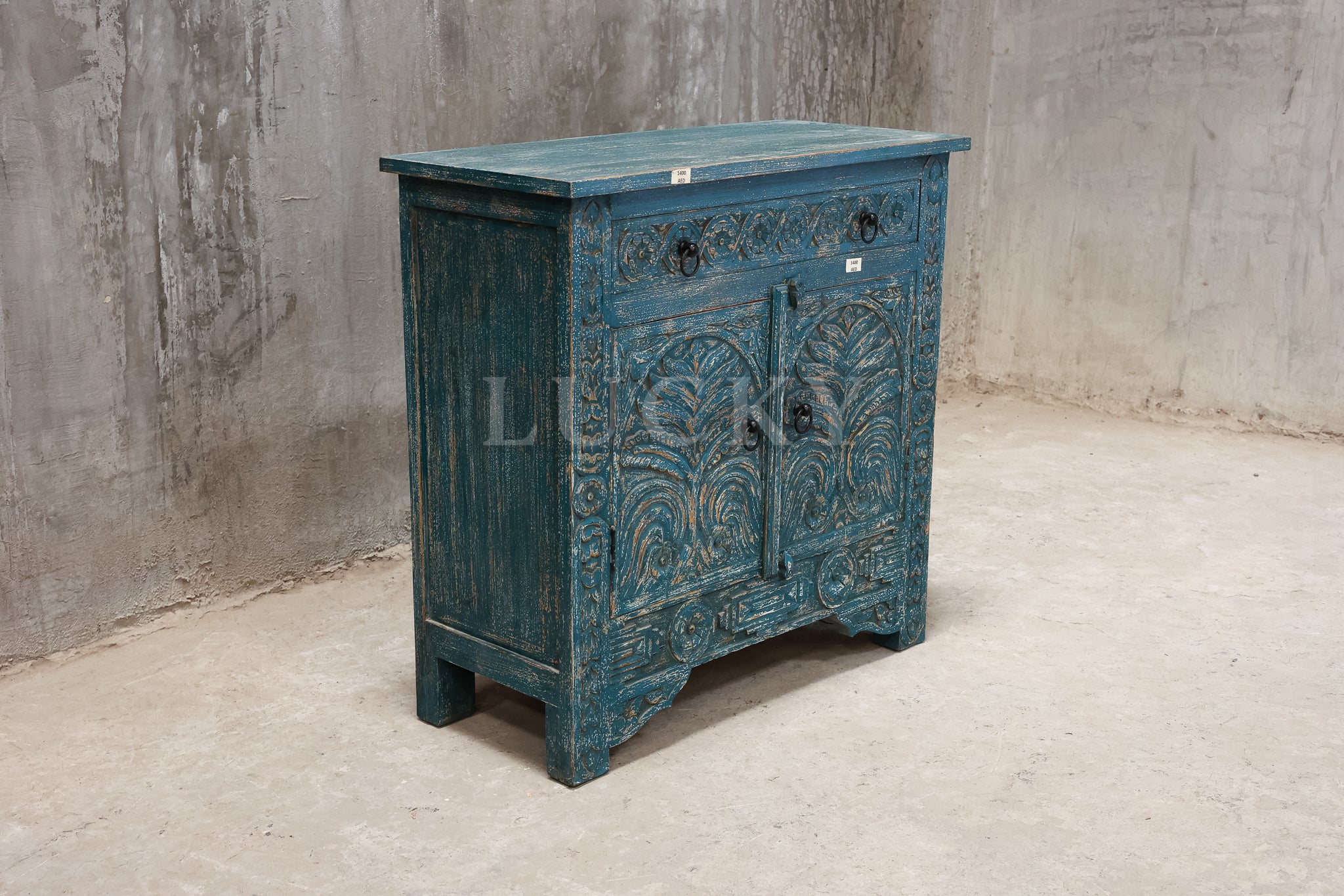 Carved vibrant sideboard.