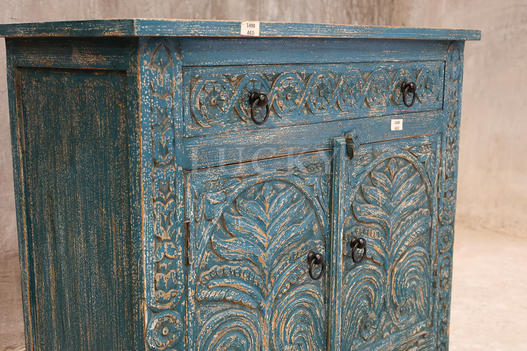 Carved vibrant sideboard.