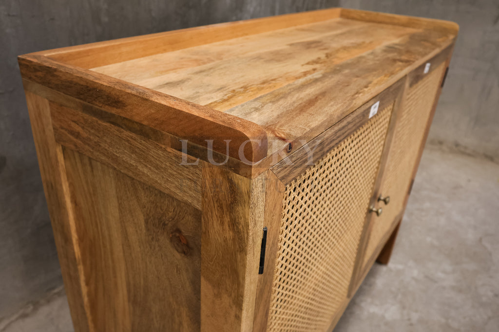 Mango wood and rattan sideboard.