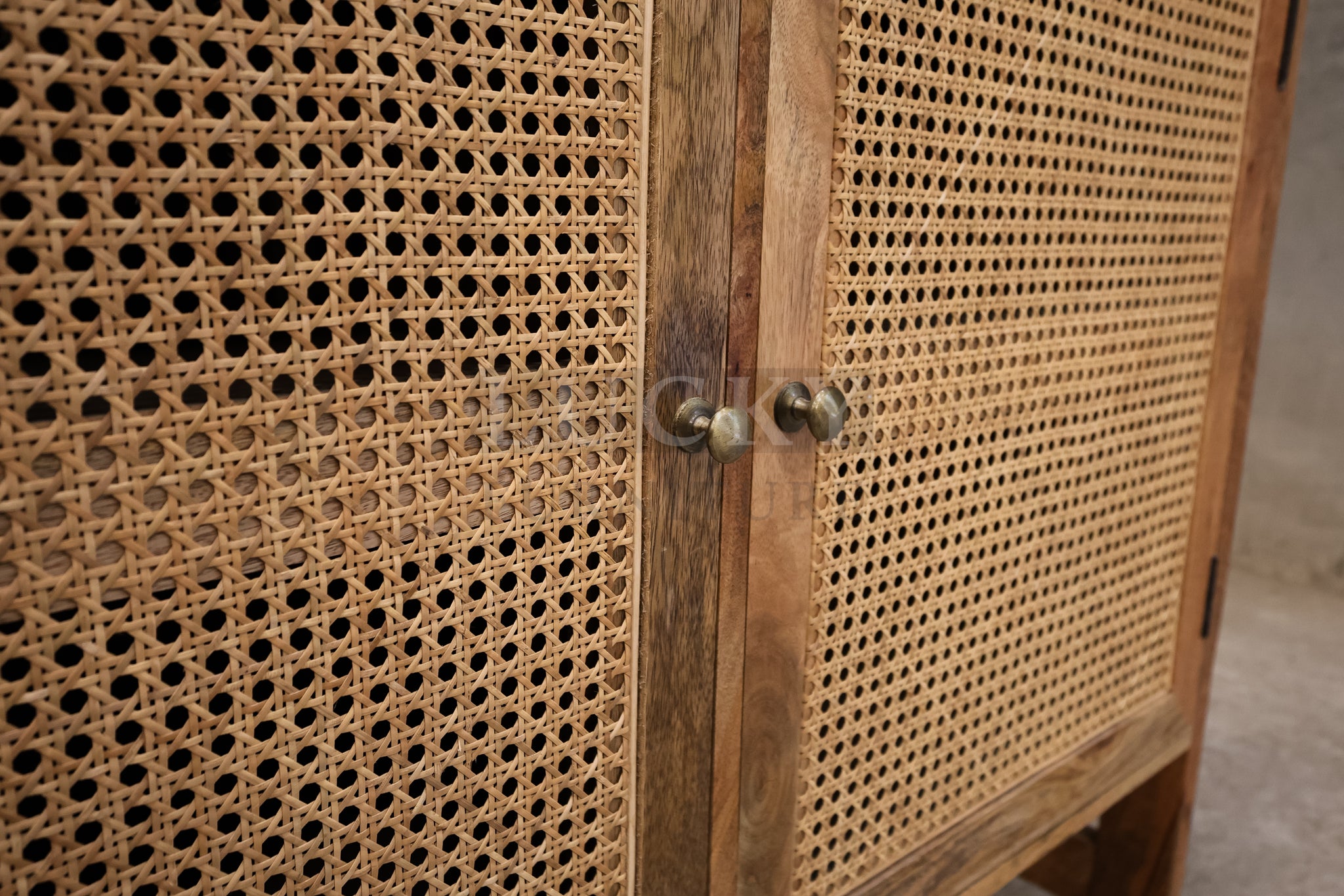 Mango wood and rattan sideboard.