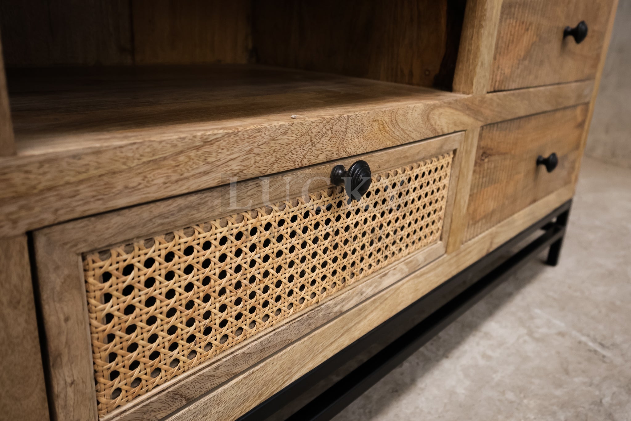 Rattan and mango wood tv stand.