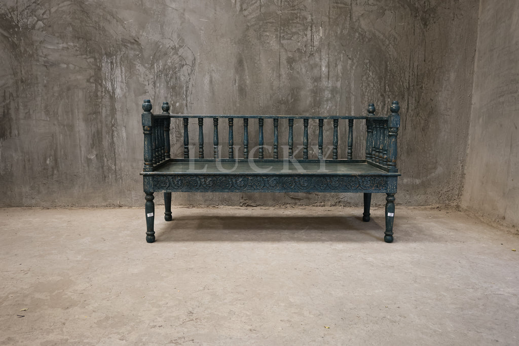 Carved vibrant bench.