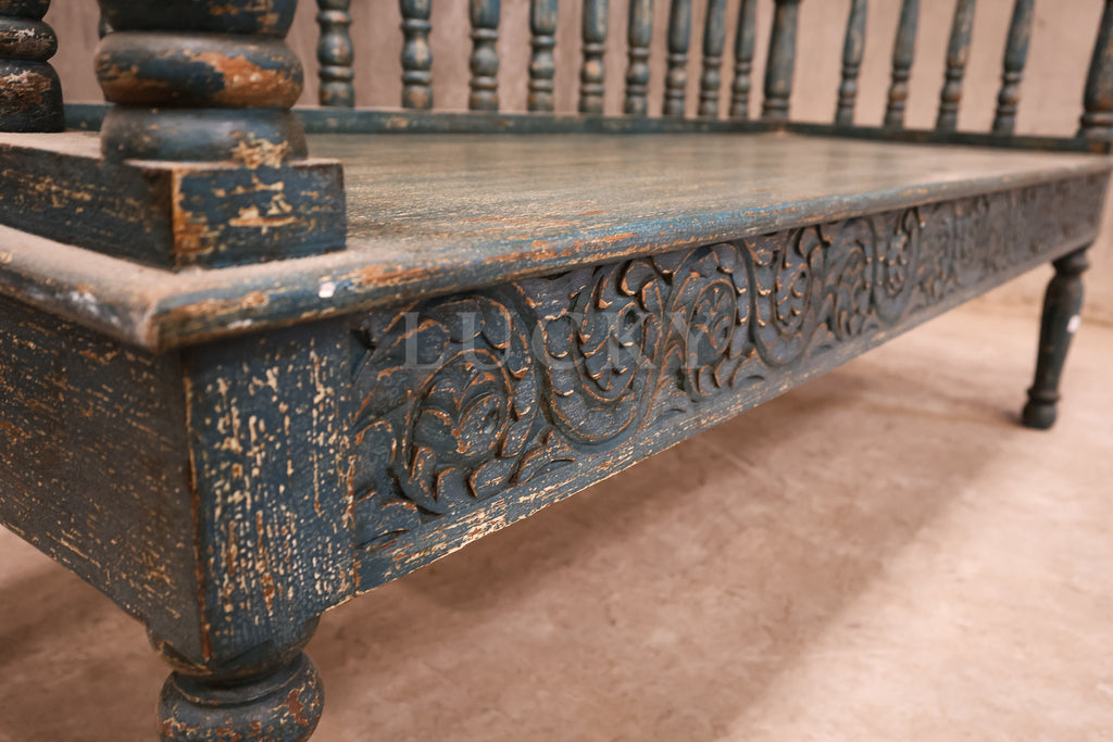 Carved vibrant bench.