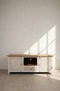 Carved two tone tv stand.