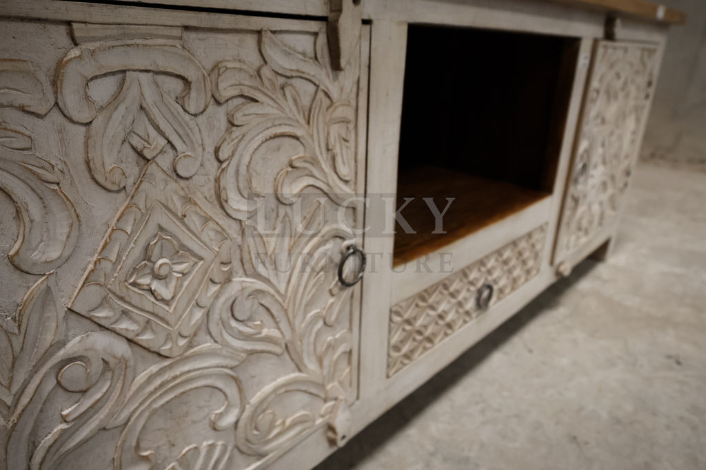 Carved two tone tv stand.