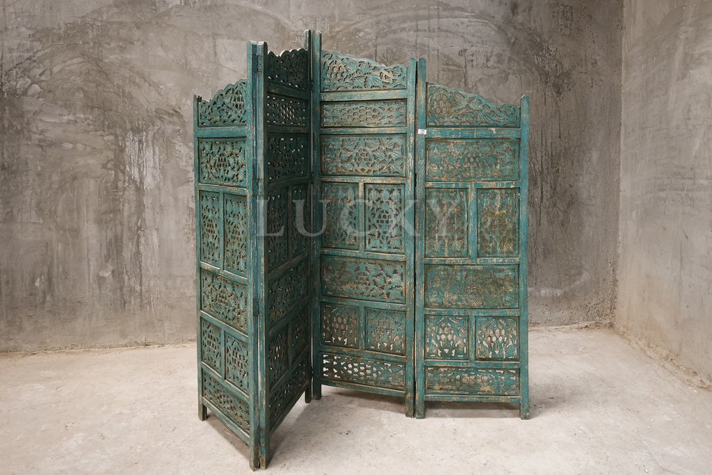 Vibrant carved room divider.