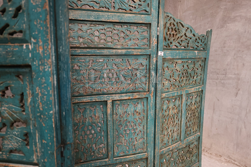 Vibrant carved room divider.