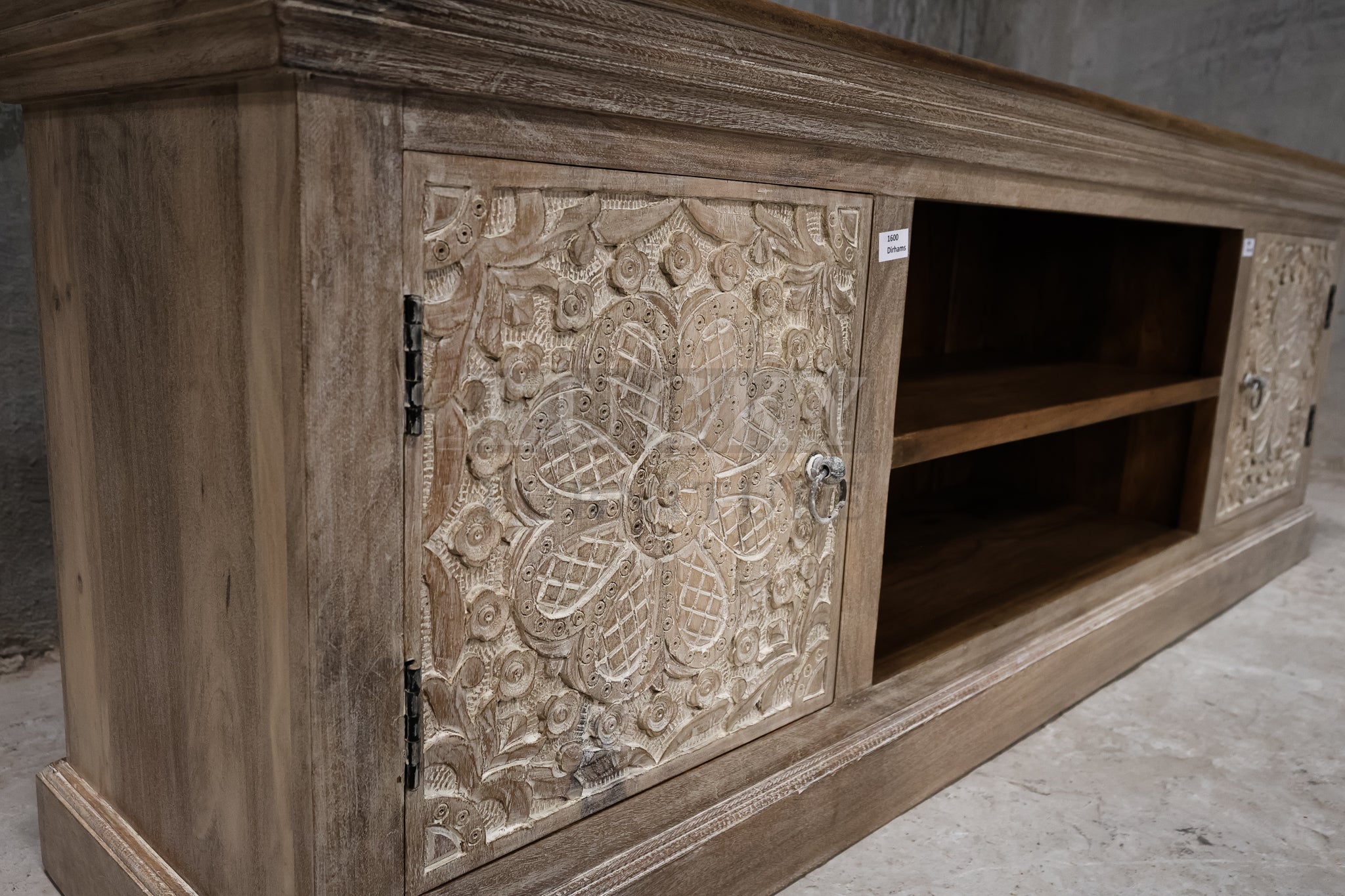 Carved two tone tv stand.